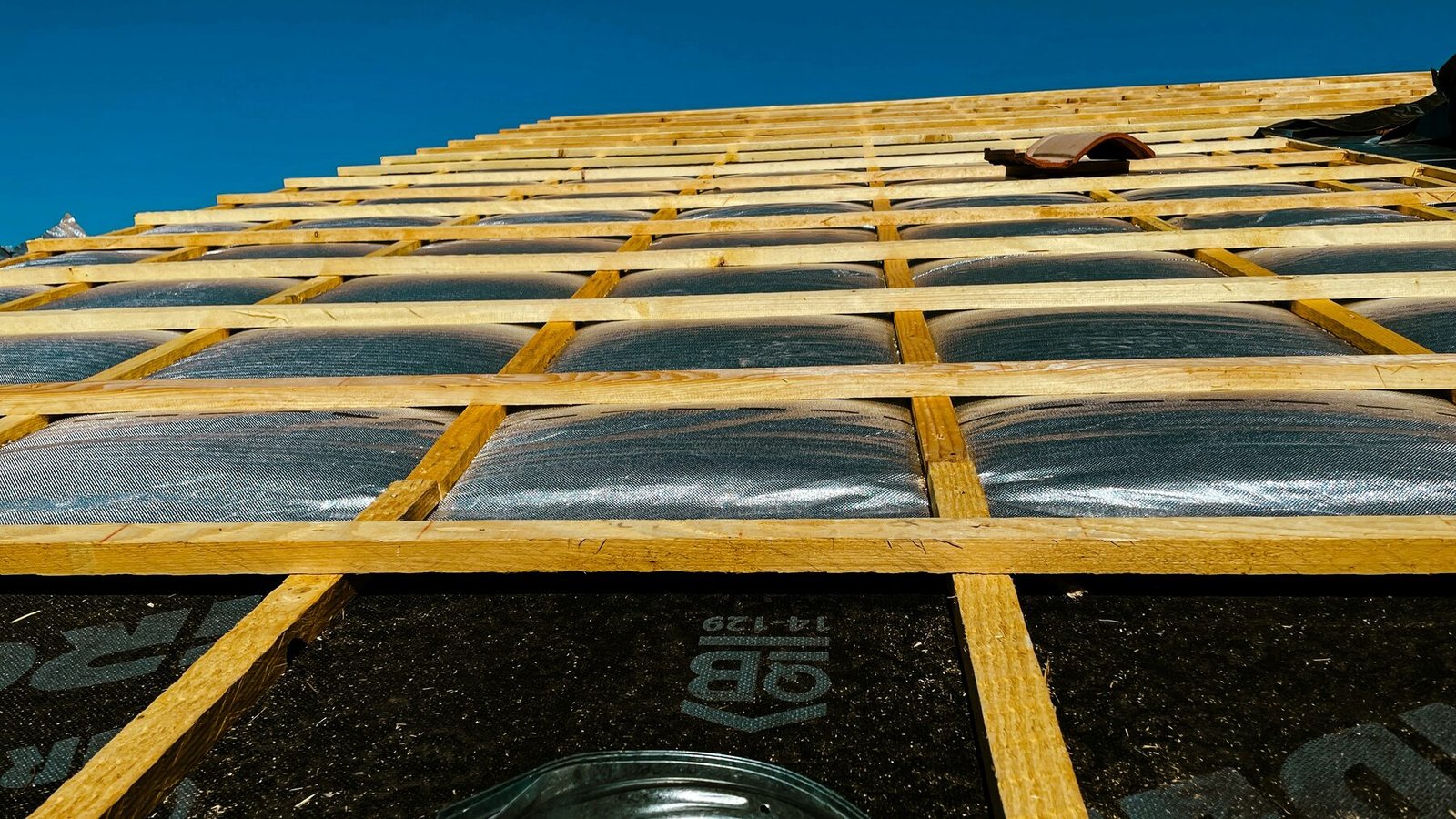 Roof tiles being inspected and repaired